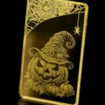 1789389948086 image of a 2026 Germania Mint Halloween 1/100 oz gold bar